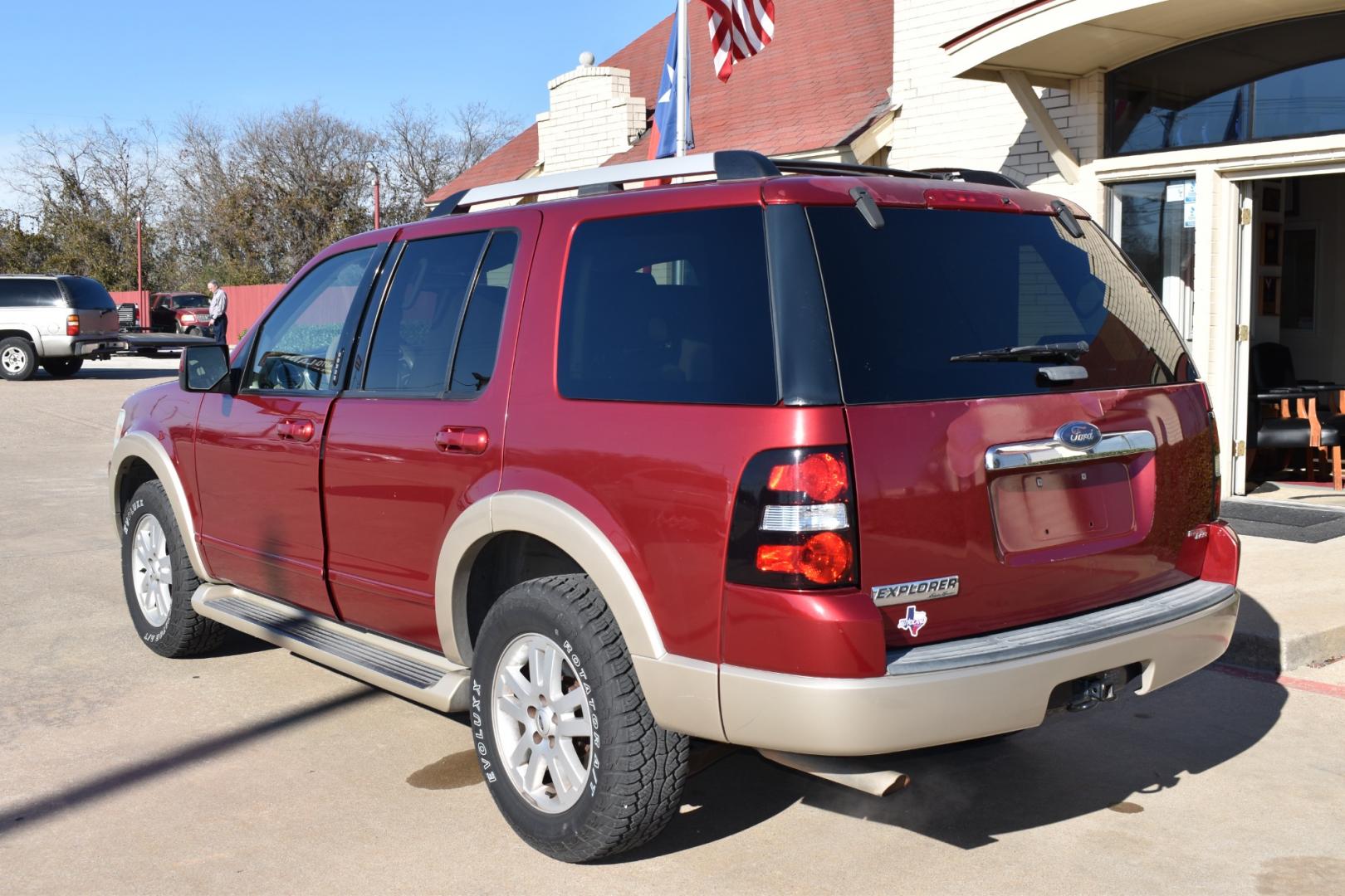 2006 Red /Tan Ford Explorer Eddie Bauer 4.0L 2WD (1FMEU64E76U) with an 4.0L V6 SOHC 16V engine, 5-Speed Automatic Overdrive transmission, located at 5925 E. BELKNAP ST., HALTOM CITY, TX, 76117, (817) 834-4222, 32.803799, -97.259003 - Photo#2